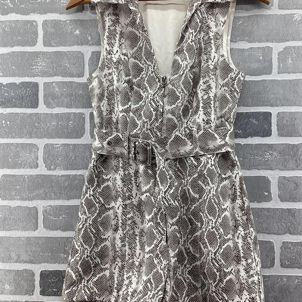 Urban Outfitters white snake print romper with zipper and belt. Size: XS
